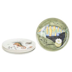 Mancioli, Italy. Five hand-decorated faience plates with colourful motifs. 1960s