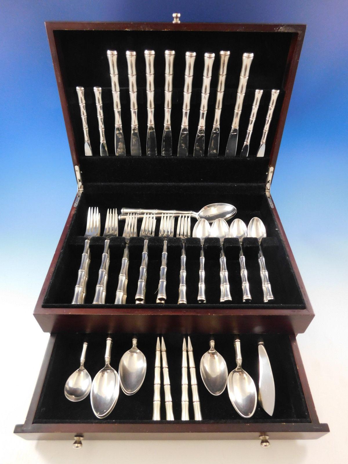 Mandarin by Towle sterling silver flatware set, 52 pieces. This chinoiserie style flatware service features hollow 3-D bamboo pattern handles. This set includes:

8 knives, 9 1/8