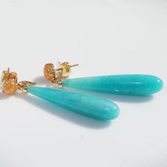 Gli orecchini di granato mandarino e amazzonite sono dei divertenti pendenti staccabili per un mix perfetto.