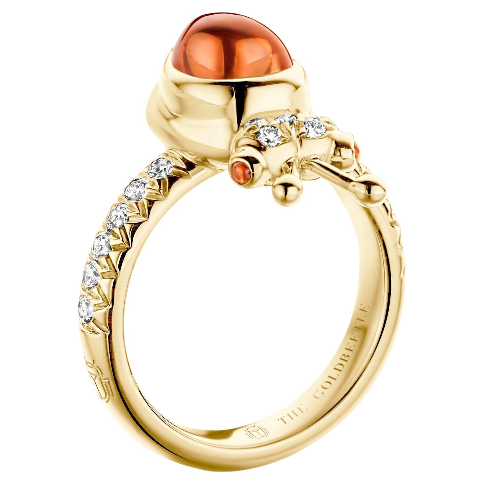 One-of-a-kind lucky beetle ring in 18K yellow gold 8,6 g set with the finest diamonds in brilliant cut 0,34Ct (VVS/DEF quality) one natural, mandarin garnet in pear cabochon cut and two pink tourmalines in round cabochon cut.