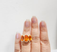 Mandarin Garnet and White Diamond Three Stone Ring in 18k Yellow Gold