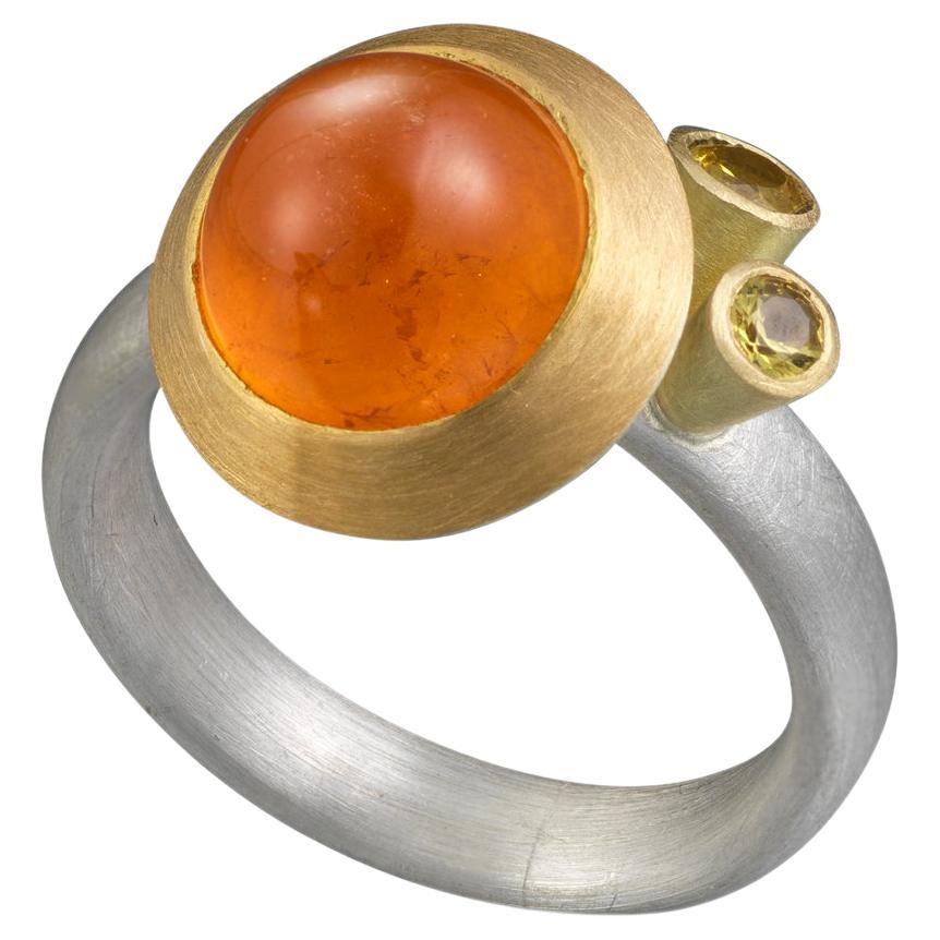Mandarin Garnet Cabochon and Yellow Sapphires Gold and Silver Ring For Sale