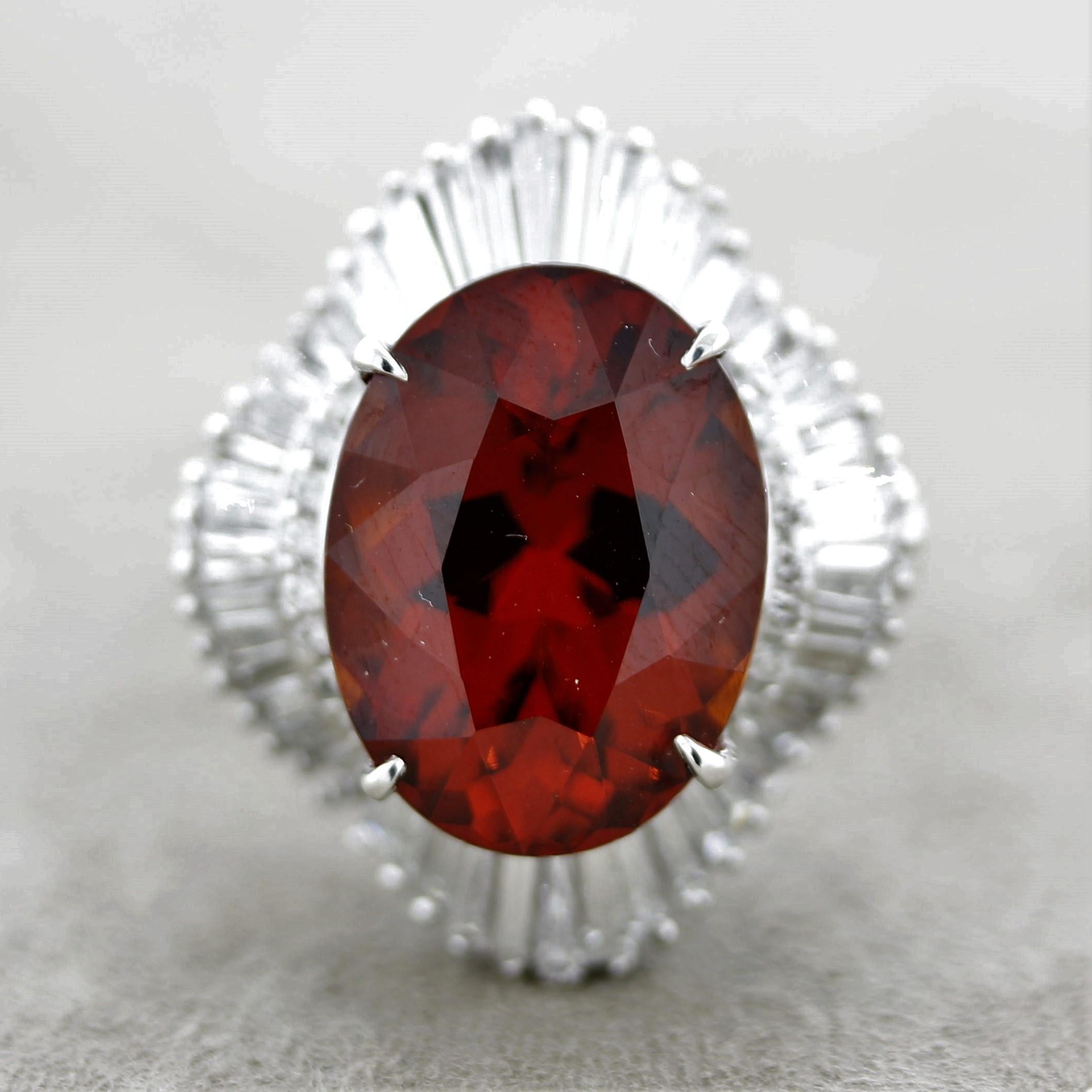 A special spessartine garnet with a bright vivid orange color giving it the trade name “mandarin” garnet. It weighs an impressive 13.60 carats and has an excellent oval-shape with plenty of brilliance and light return. It is complemented by 1.71