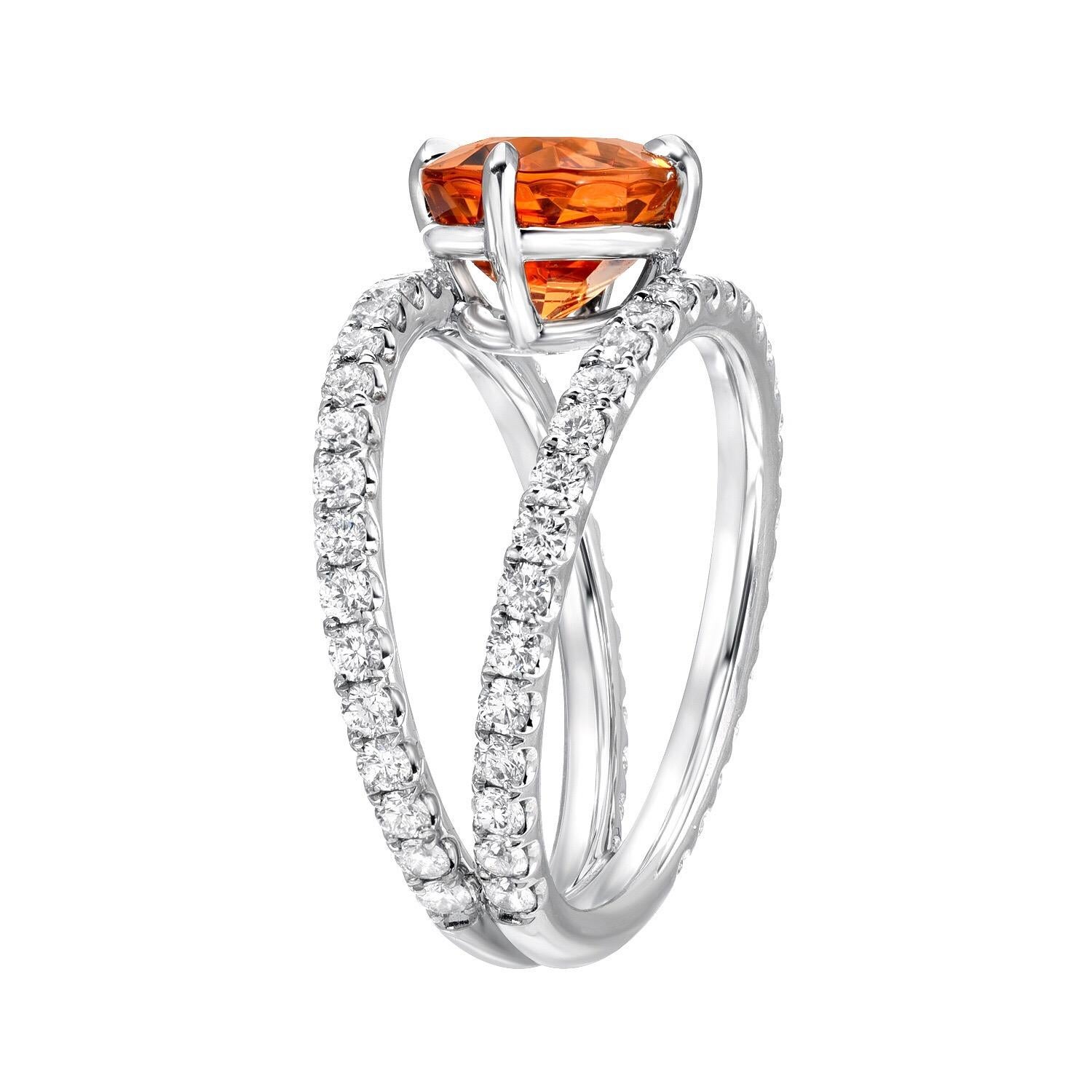 Ultra fine and vibrant 3.65 carat Mandarin Garnet oval, set in a unique 1.06 carat total, diamond platinum ring.
Ring size 6. Resizing is complimentary upon request.
Returns are accepted and paid by us within 7 days of delivery. 

Garnet is the