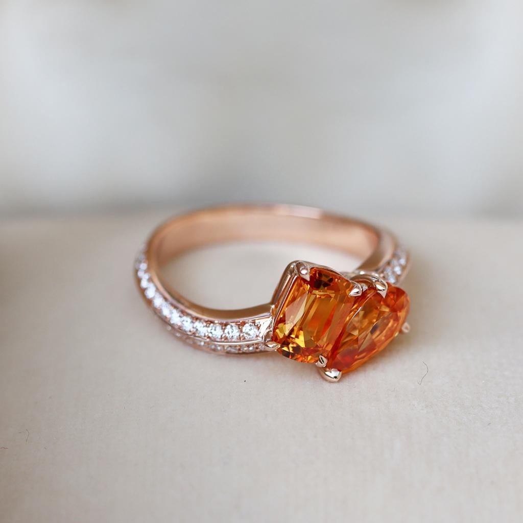 One of a kind Toi et Moi ring handmade in Belgium and handmade the traditional way ( no casting or printing involved ). Set with 2 Mandarin Garnets and pave set Brilliant-cut white diamonds on the ring Shank.

18K Rose Gold: 4.6 g
1 X Pear shape