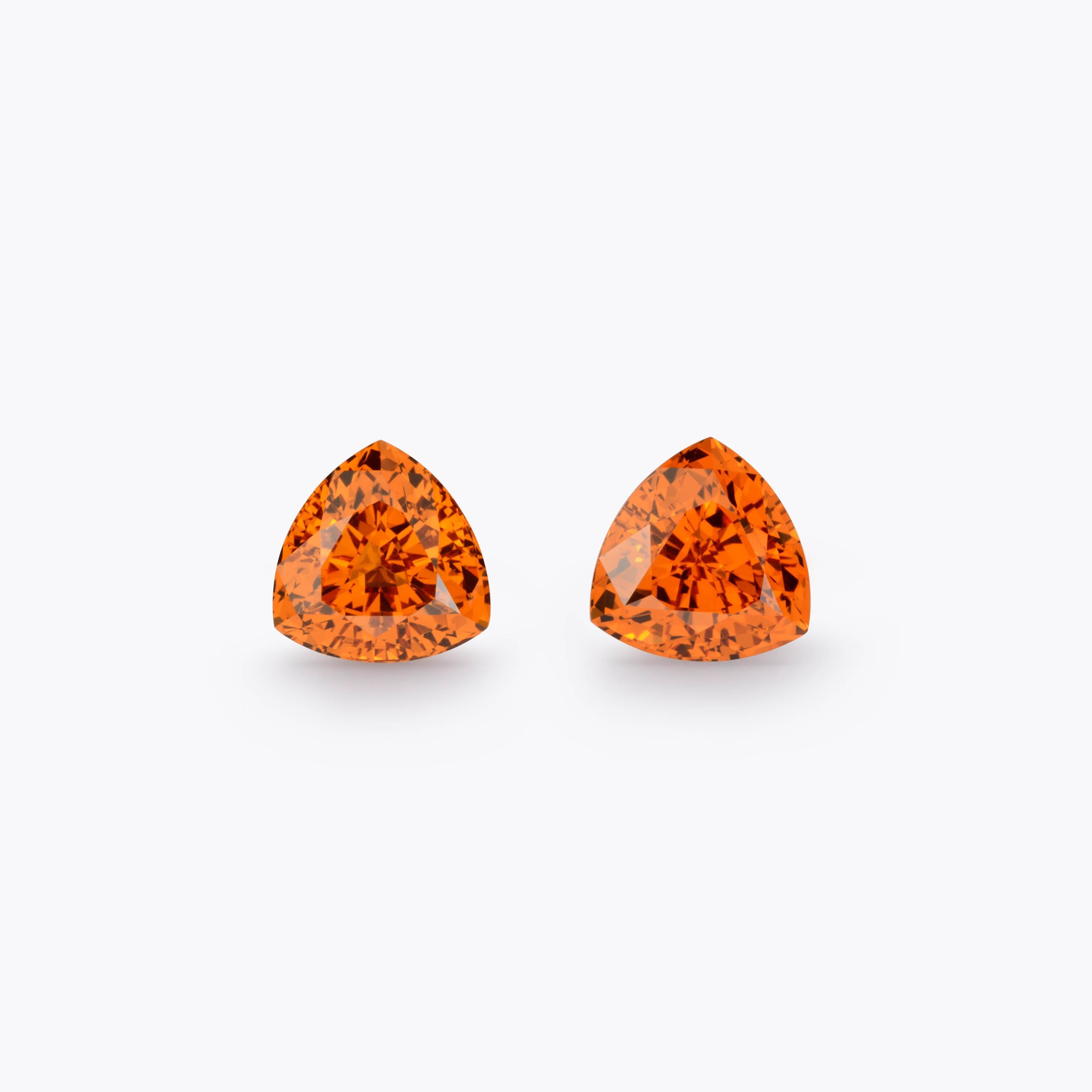 Spectacular Mandarin Garnet Trillion pair totaling 3.39 carats, offered unmounted for a unique custom pair of earrings.
Dimensions: 7 x 7 x 4.4 mm.
Returns are accepted and paid by us within 7 days of delivery.
We offer supreme custom jewelry work