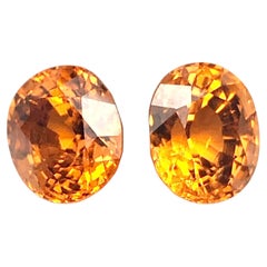 Natural Untreated Mandarin Garnet Gemstone Pair, 5.80 Carats, Oval