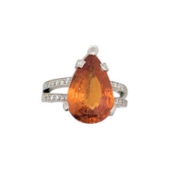 Mandarin Garnet Pear and White Diamond Round Diamond Ring in Platinum