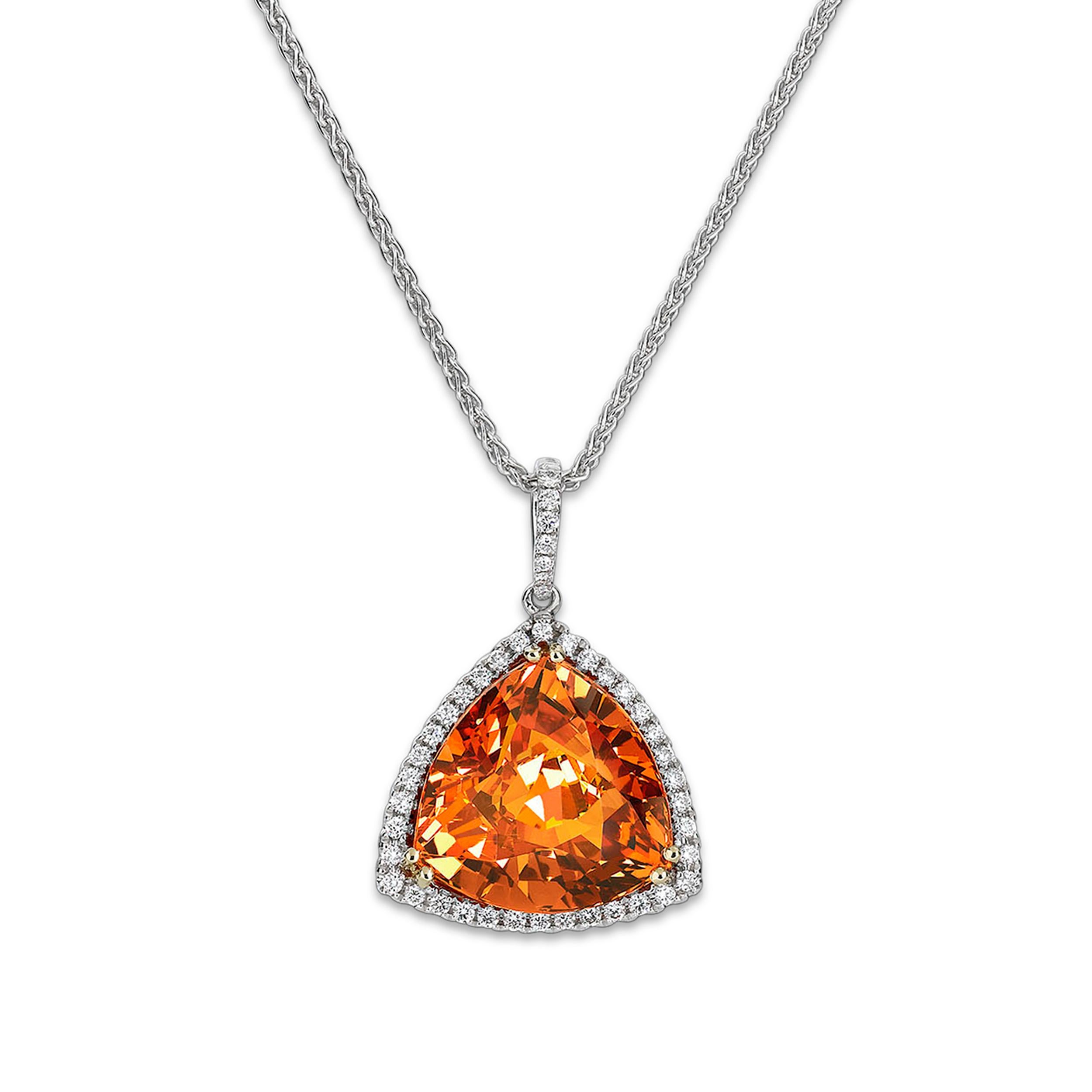 All the radiance of a fiery evening sky shines from this rare Mandarin garnet. Displaying a rich 