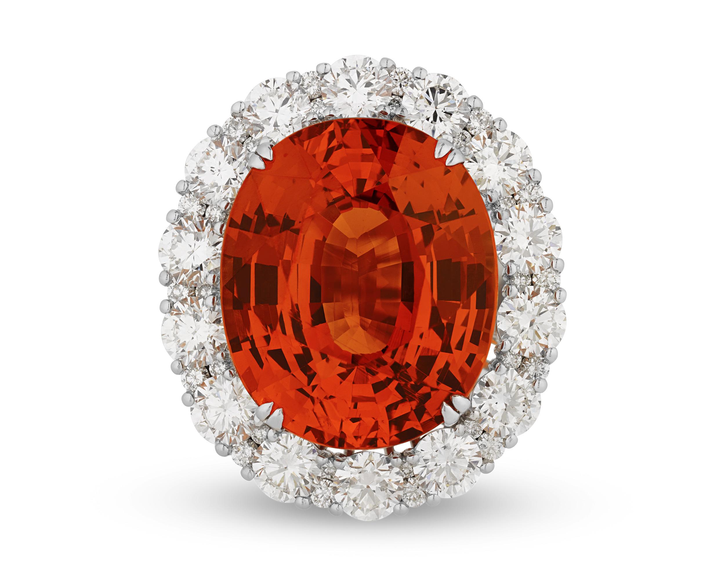 The radiance of the sunset shines from this rare Mandarin garnet. A type of Spessartite garnet, the first Mandarin garnets were discovered in Namibia in 1991, and soon after this unique variety began to garner the attention of the international