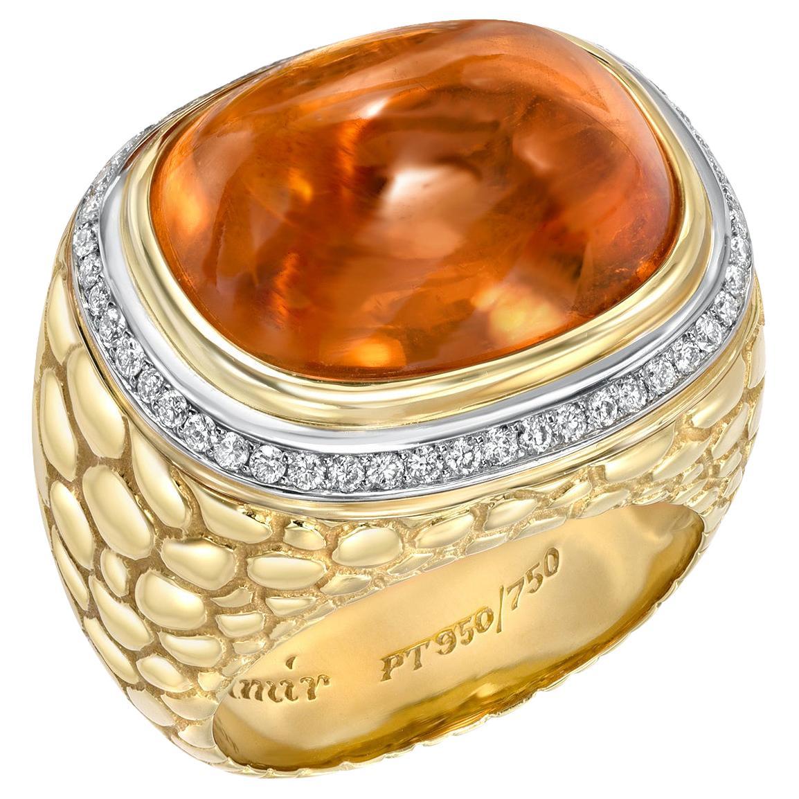 One of a kind, state of the art, Crocodile pattern ring, set with an extraordinary, collection quality 29.93 carat Mandarin Garnet Sugarloaf Cabochon, surrounded by a total of 0.40 carats of diamonds.
Hand crafted by extremely skilled hands in 18K