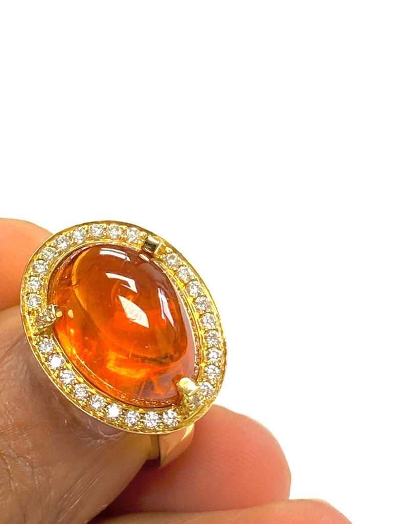 Contemporary Goshwara  Oval Cabochon Mandarin And Diamond Ring For Sale