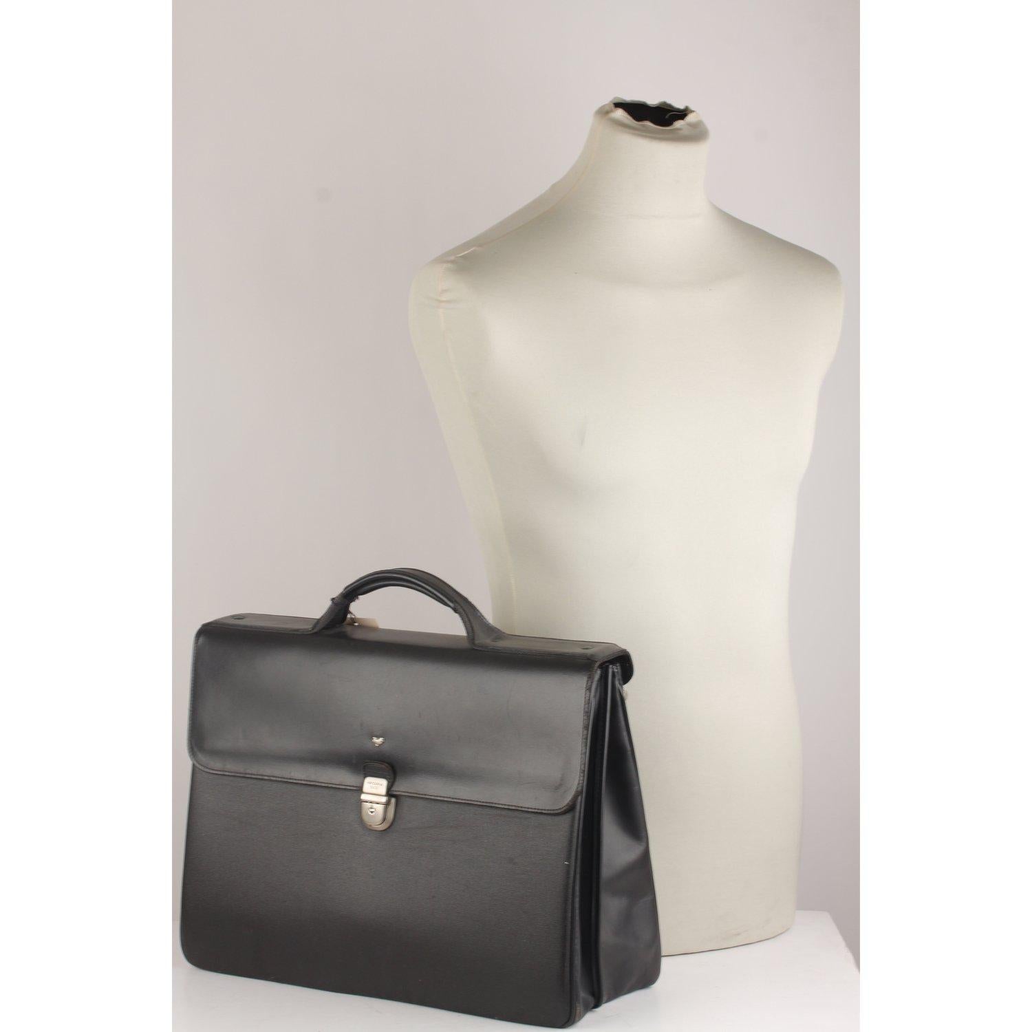 MATERIAL: Canvas, Leather COLOR: Black MODEL: Briefcase GENDER: Women, Men SIZE: Large Condition CONDITION DETAILS: B :GOOD CONDITION - Some light wear of use - Some wear of use on leather flap (slight opaque marks and light superficial scratches),