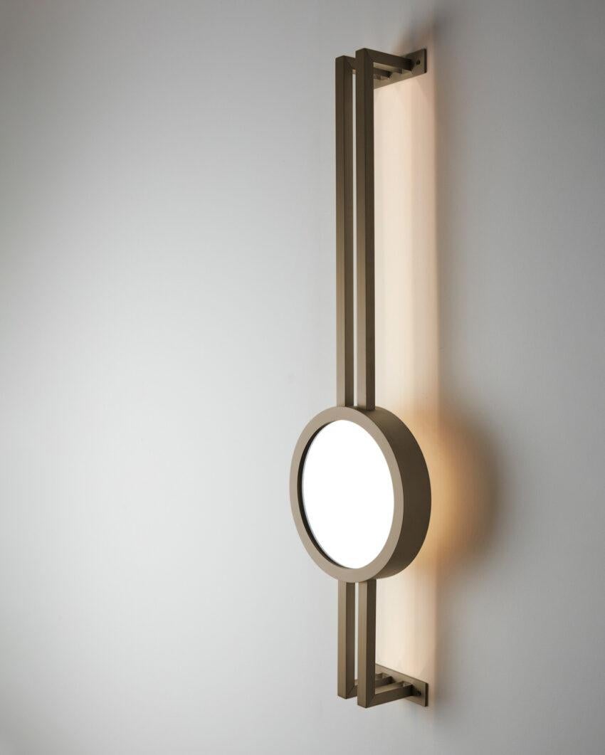 Mandolin Brushed Bronze Wall Mounted Lamp by Carla Baz
Dimensions: D 13 X W 29 x H 110 cm.
Materials: Brushed bronze.
Weight: 6 kg.

Available in different finishes and materials: blackened metal, brushed brass, brushed bronze, brushed copper and