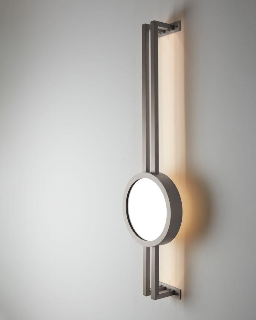 Mandolin Brushed Stainless Steel Wall Mounted Lamp by Carla Baz
Dimensions: D 13 X W 29 x H 110 cm.
Materials: Brushed stainless steel.
Weight: 6 kg.

Available in different finishes and materials: blackened metal, brushed brass, brushed bronze,