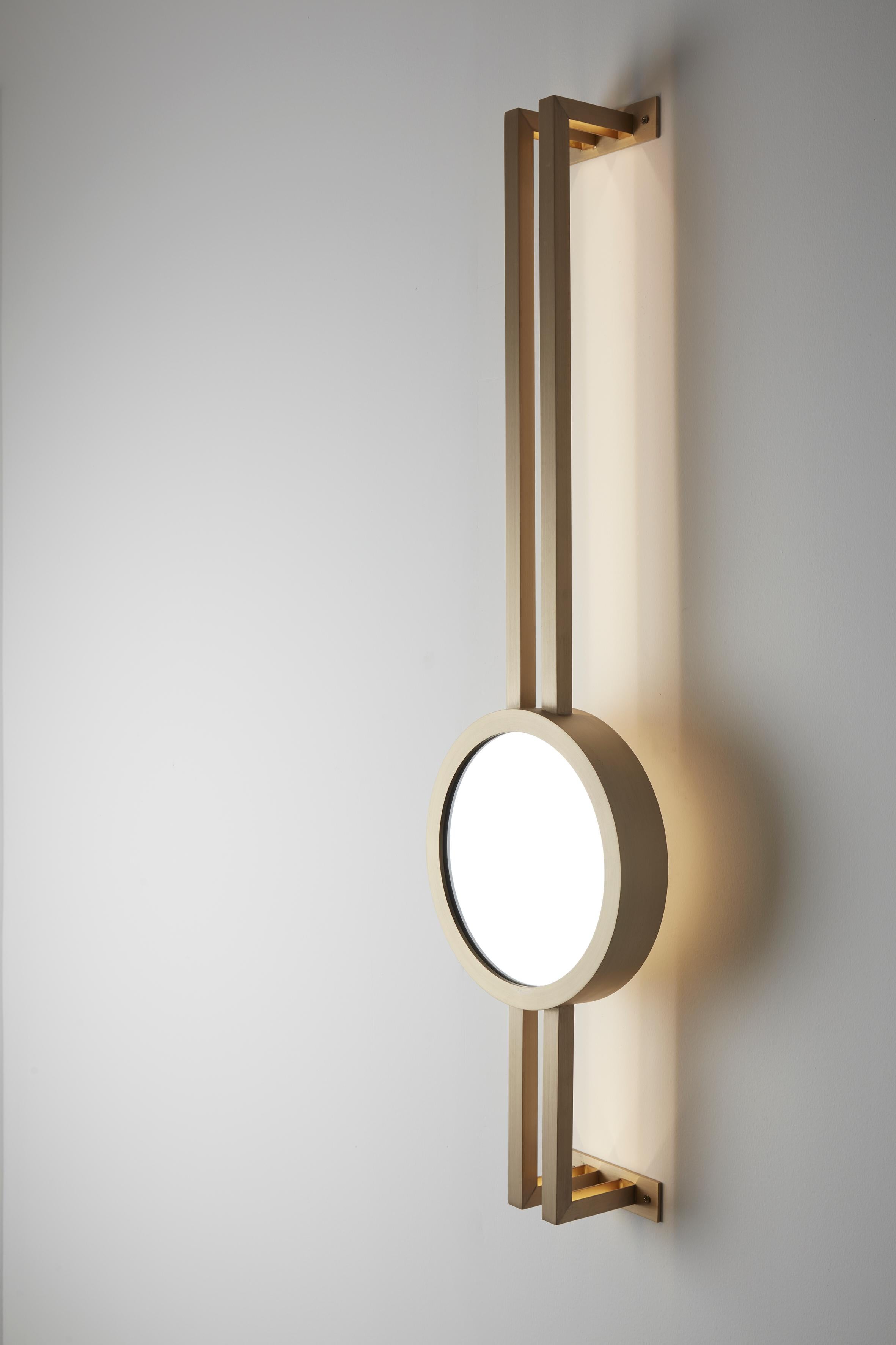 Mandolin wall mounted brass - Carla Baz
Dimensions: ø 29 x H 110 x D 13 cm
Weight: 6 kg
Material: Brass

Mandolin evokes intimacy and warmth. Just like a serenade is meant for a special person, these backlit mirrors are intended to furtively
