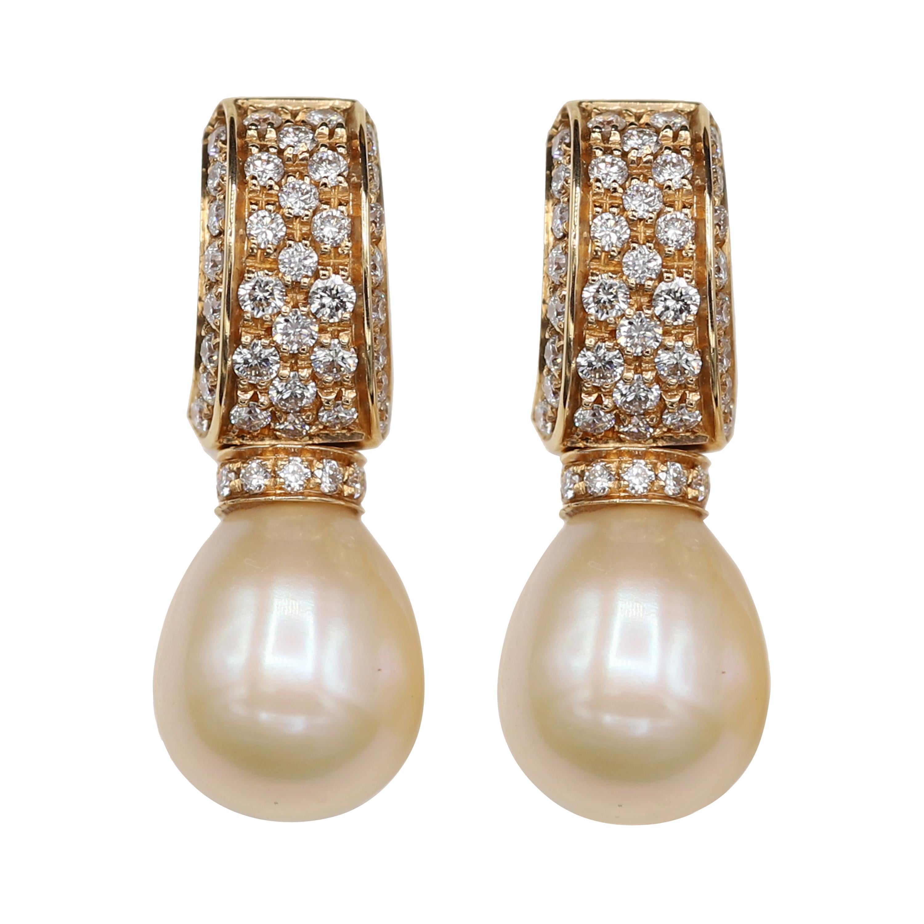 Boucles d'oreilles pendantes Mandrin en or rose et blanc 18 carats avec perles dorées