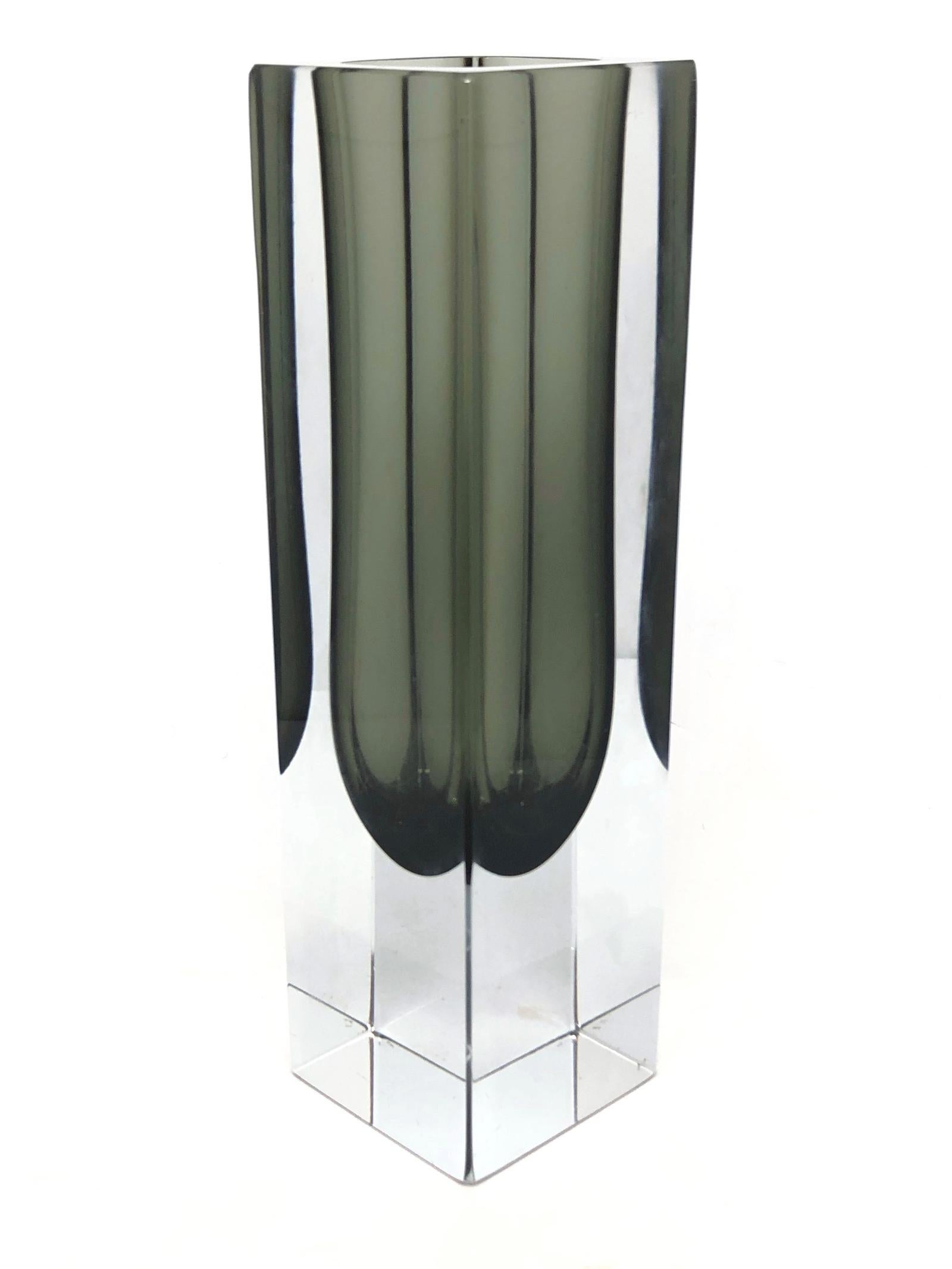 An amazing Venetian Murano glass Mid-Century Modern Mandruzzato vase made in Italy, circa 1960s. This is a heavy glass block vase. Black or dark grey inside within clear. The top of the vase is flat cut. Vase is in very good condition.