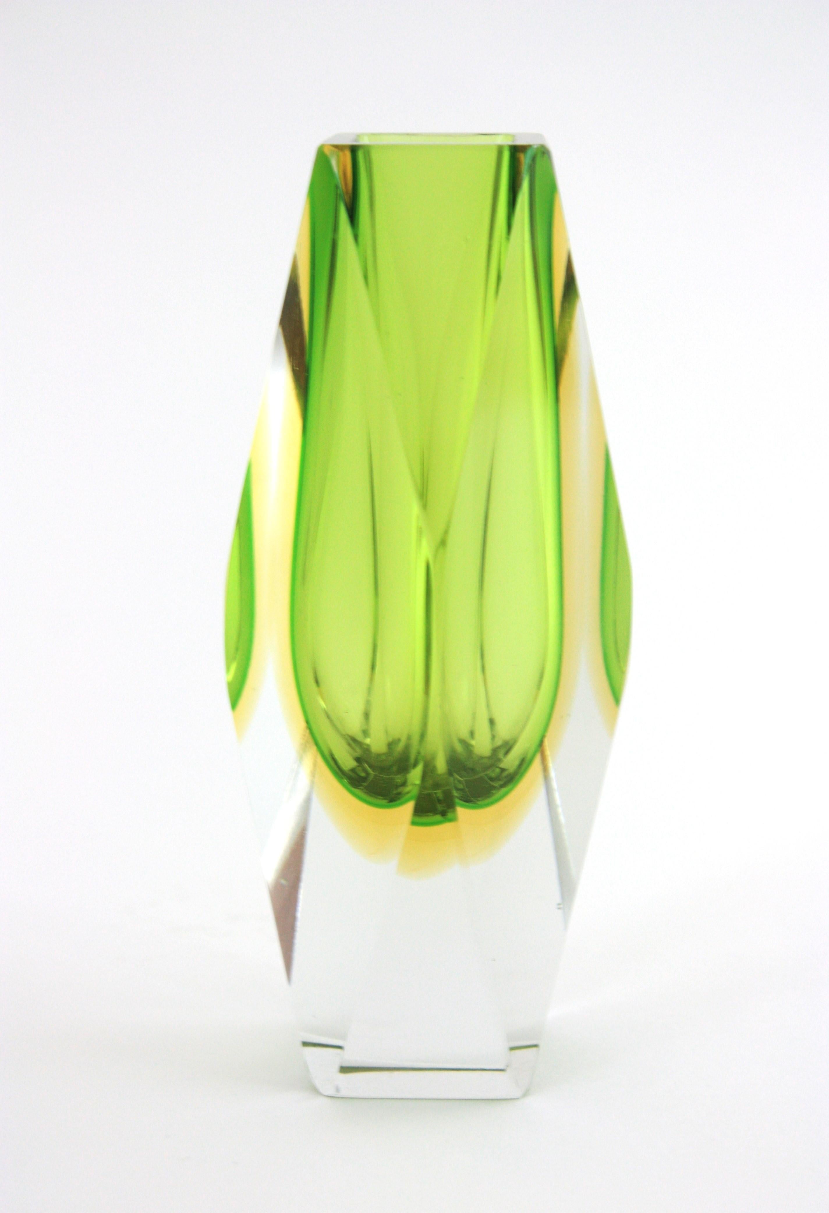 Eye-catching Sommerso Murano faceted vase in Lime Green and Yellow glass attributed to Mandruzzato. 
Italy, 1960s.
Green and yellow glass cased into clear glass using the Sommerso technique. 
Excellent condition. No chips, no cracks to notice.