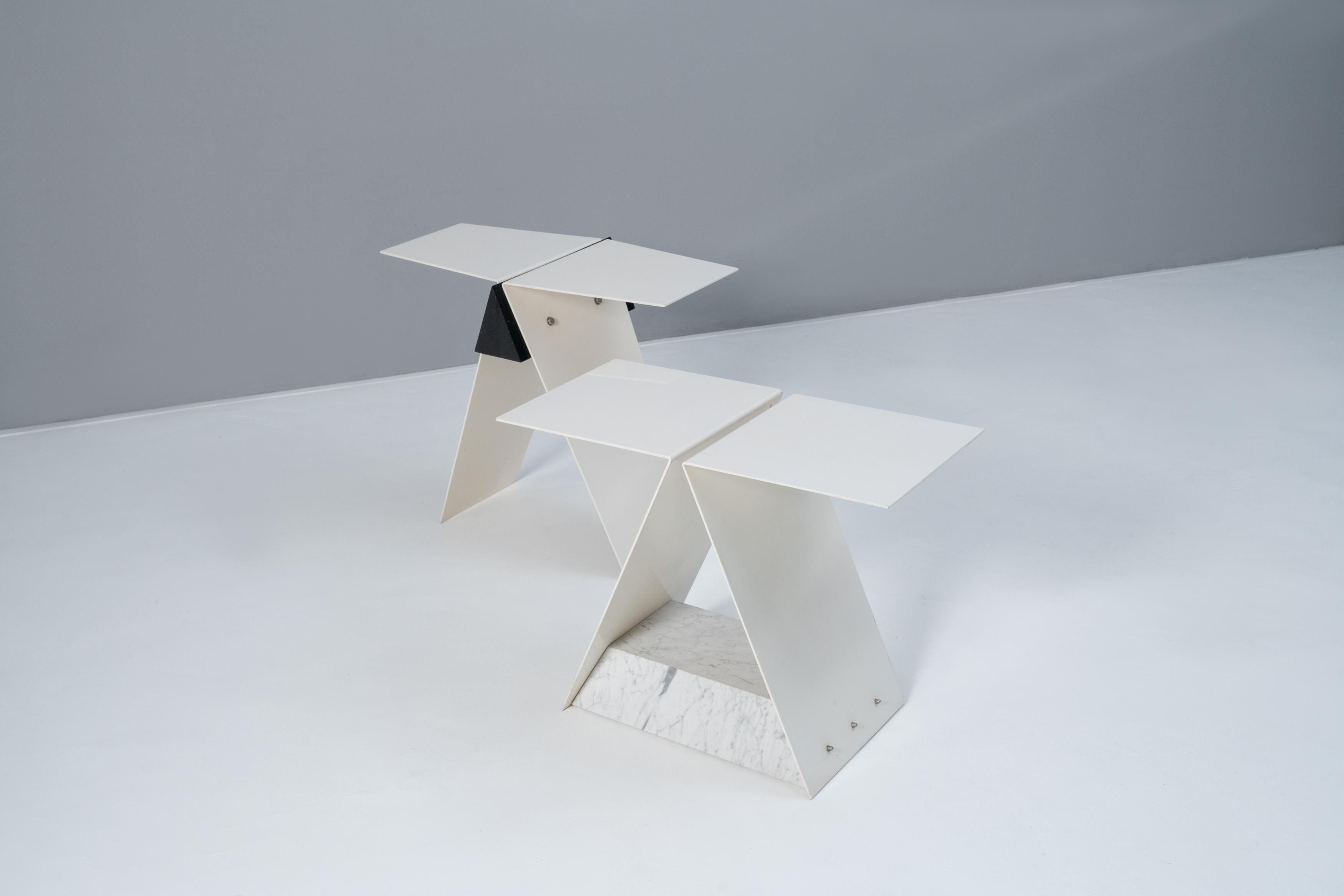 Two tables by Manfred Billinger in white lacquered steel and marble. Each marked with a metal plaque: M. Billinger 1983.

Provenance: Art collection Peter Schenning / Goslar
Similar in materiality and lines, but different in form, the two tables by