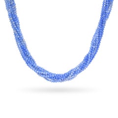 Collana Manfredi a più fili con perline in calcedonio viola e oro giallo 18k