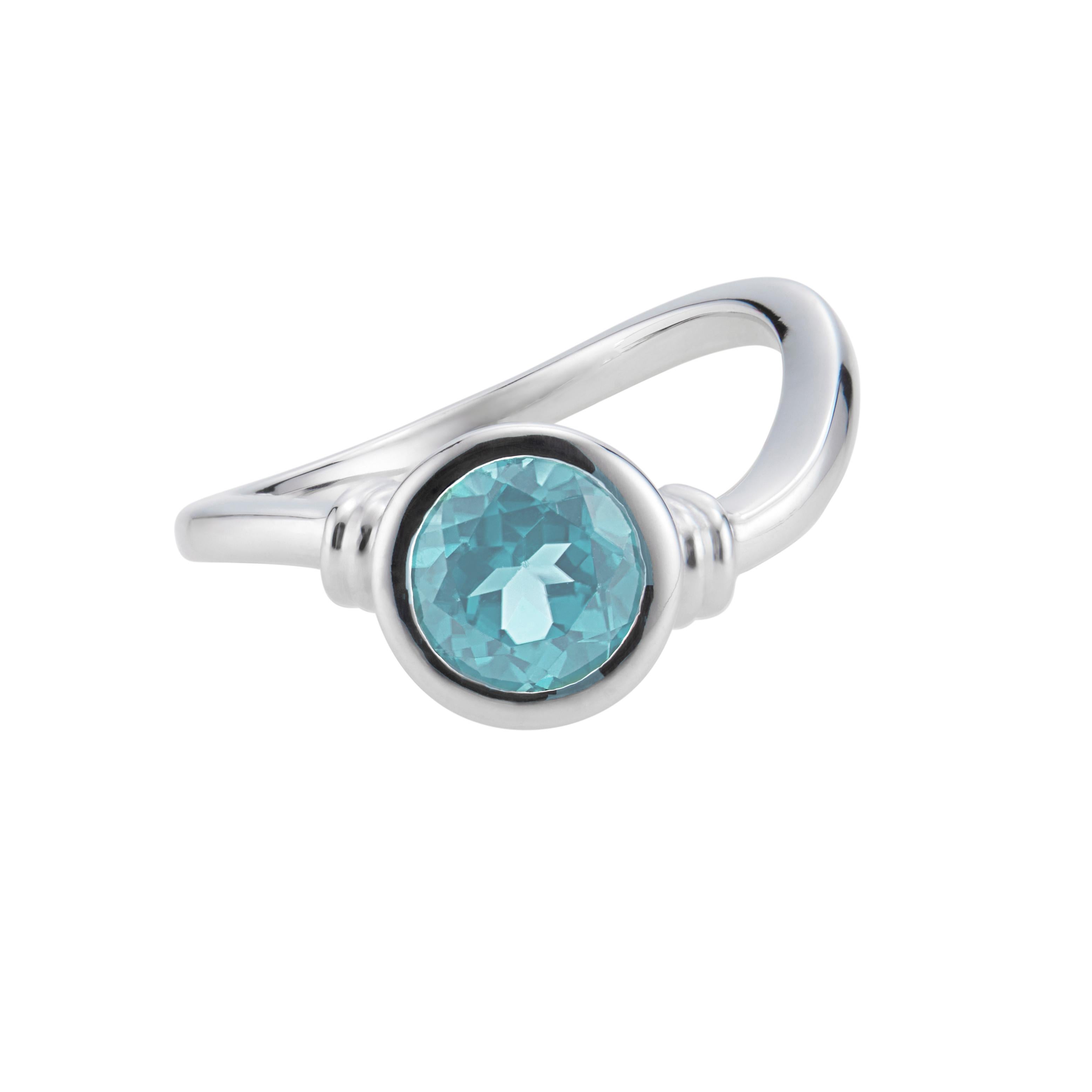Manfredi of Greenwich, CT, Aquamarine engagement ring. .95ct round aquamarine center in an 18k white gold setting.  

1 round blue aquamarine, MI approx. .95cts
Size 7 and sizable 
18k white gold 
Stamped: 750
Hallmark: Manfredi 
6.3 grams
Width at