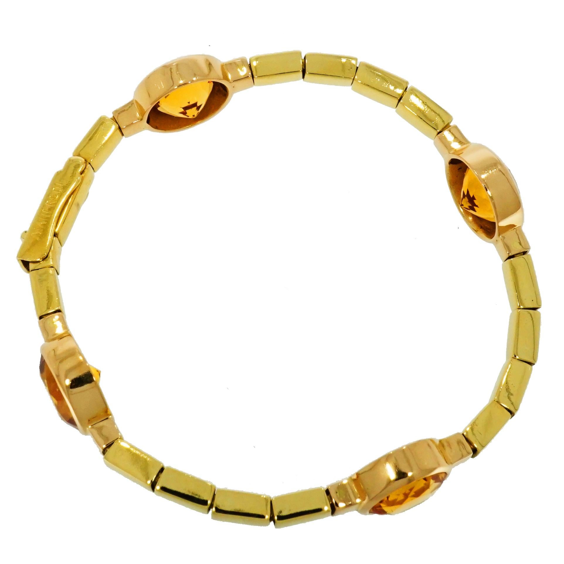 Gorgeous Bracelet!! Very clean and tailored design.
Handcrafted in Italy by Manfredi in high polished 18k Yellow Gold straight links connecting four bezel set 12mm Round Citrine. 
The Bracelet measures 7 inches.
A must have in your collection ;)