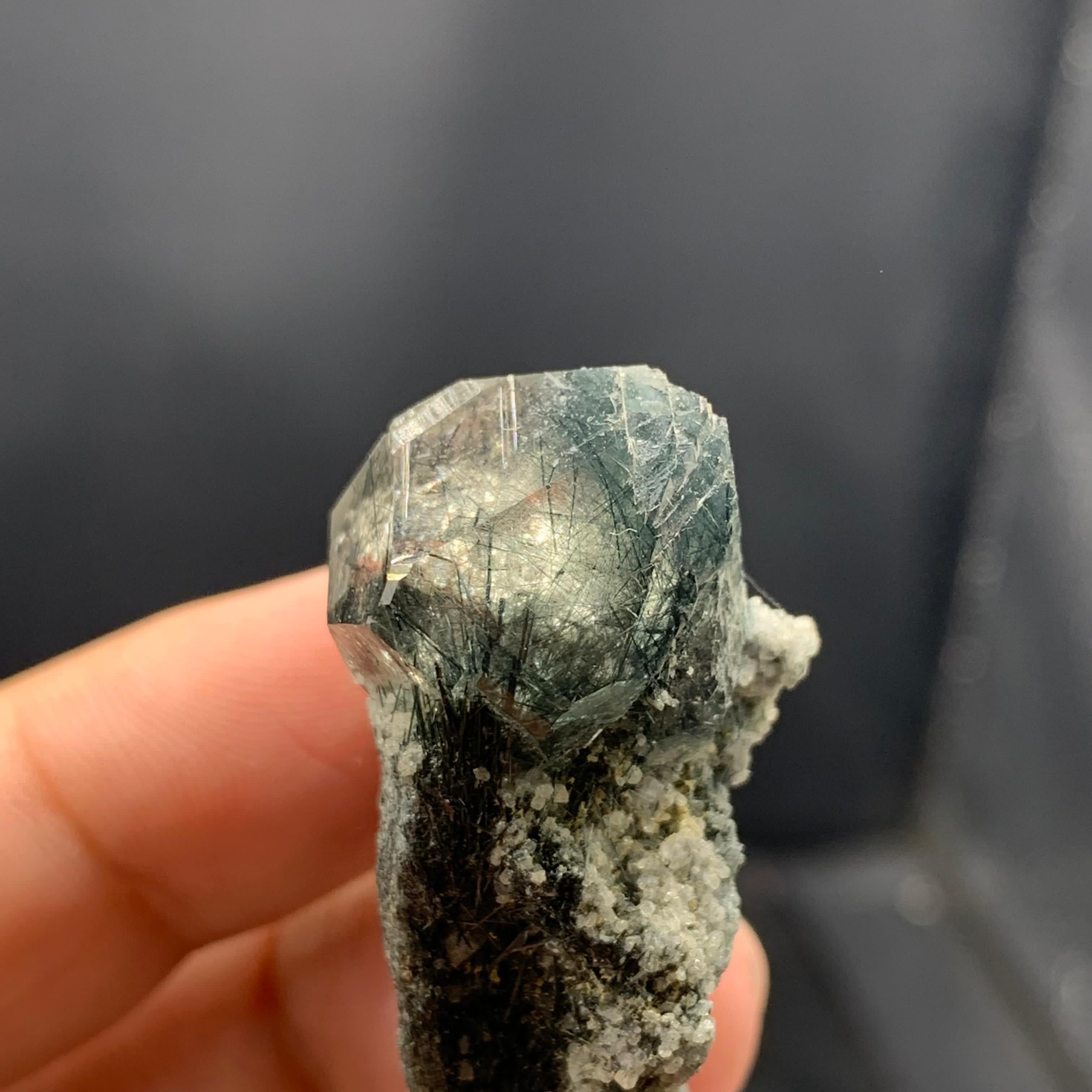 PRODUCT INFORMATION:

Specimen Type: Manganeso Riebeckite Rutile Included Blue Quartz Crystal On Matrix
Weight: 21 grams
Dimension: 4 × 2.8 x 2 cm
Origin: Zagi Mountains, KPK Province, Pakistan
Treatment: None

DESCRIPTION:

This is cute and