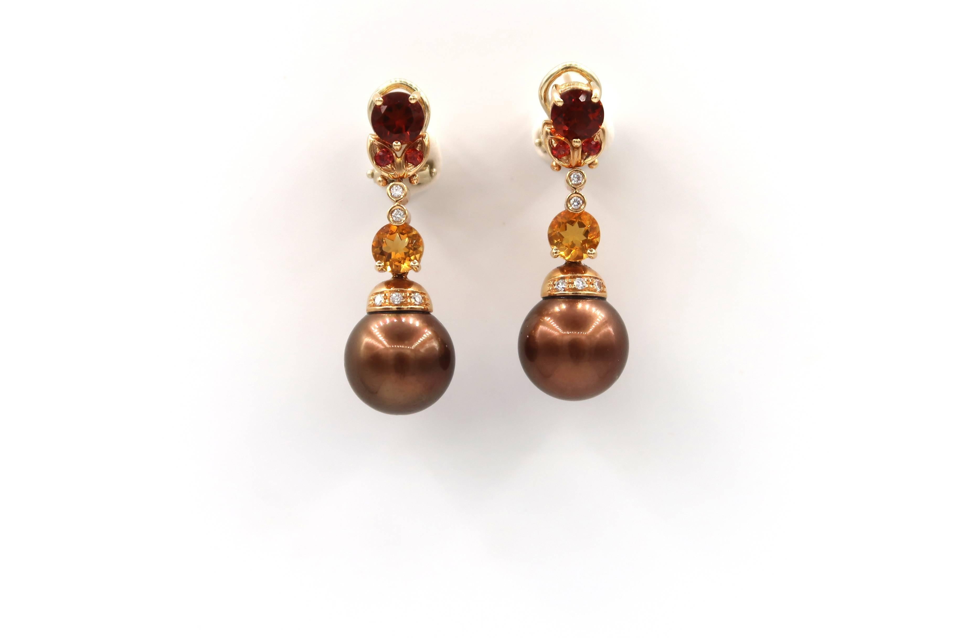 Spessartite, Citrine and Diamond Dangle Earrings with Chocolate Brown Pearls in 18K Rose Gold

Gold: 18K Rose/Pink Gold, 14.58 g
Diamond: 0.25 ct
Spessartite & Citrine: 3.75 ct
Pearl: Chocolate Brown Pearls, 13 mm

Length: 1.5 inches