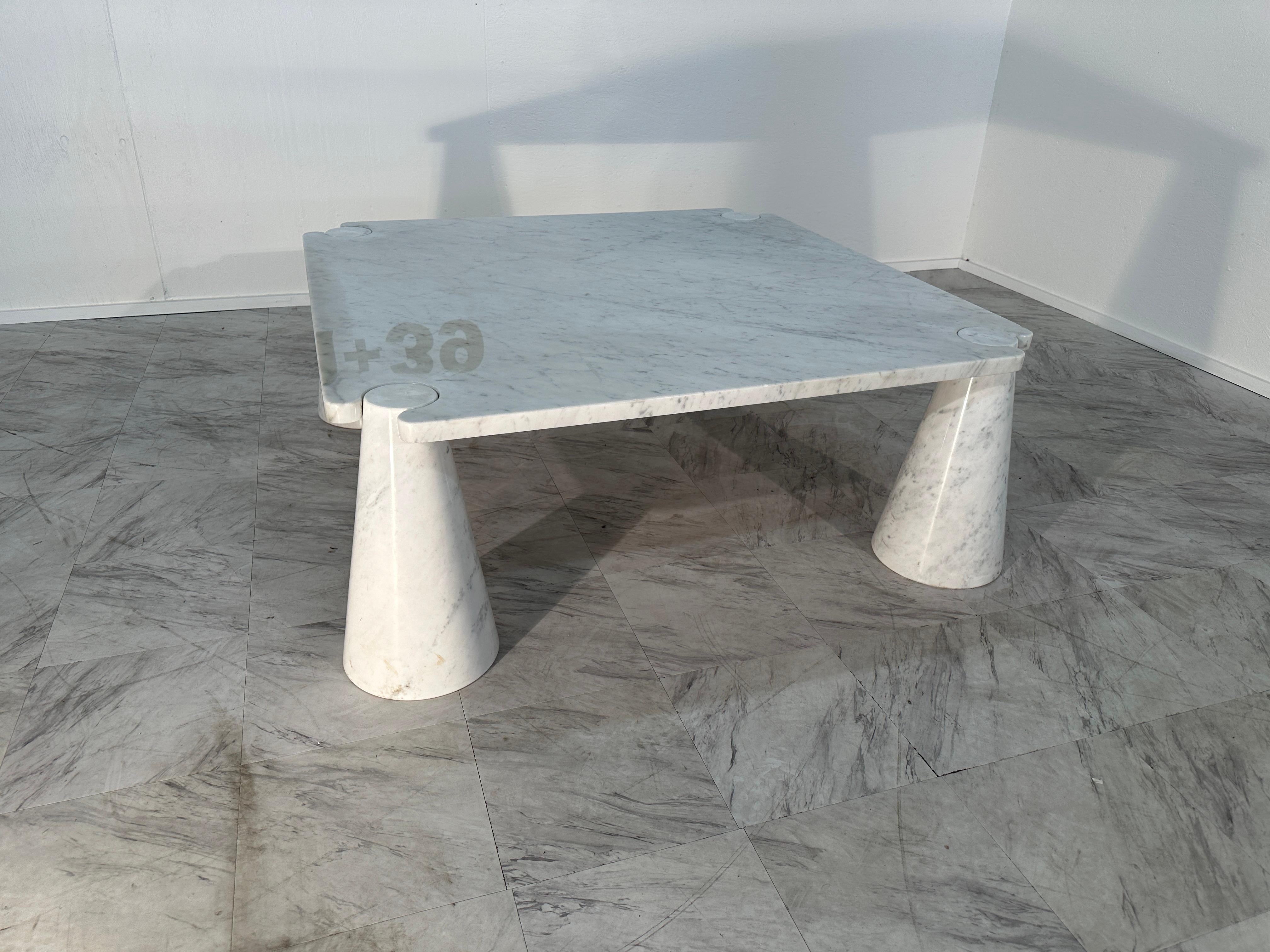 The Mangiarotti 'Eros' Square Marble Coffee Table from Italy in the 1970s is a striking and iconic piece of furniture. Designed by Angelo Mangiarotti, a prominent Italian architect and designer, the table is characterized by its square shape and