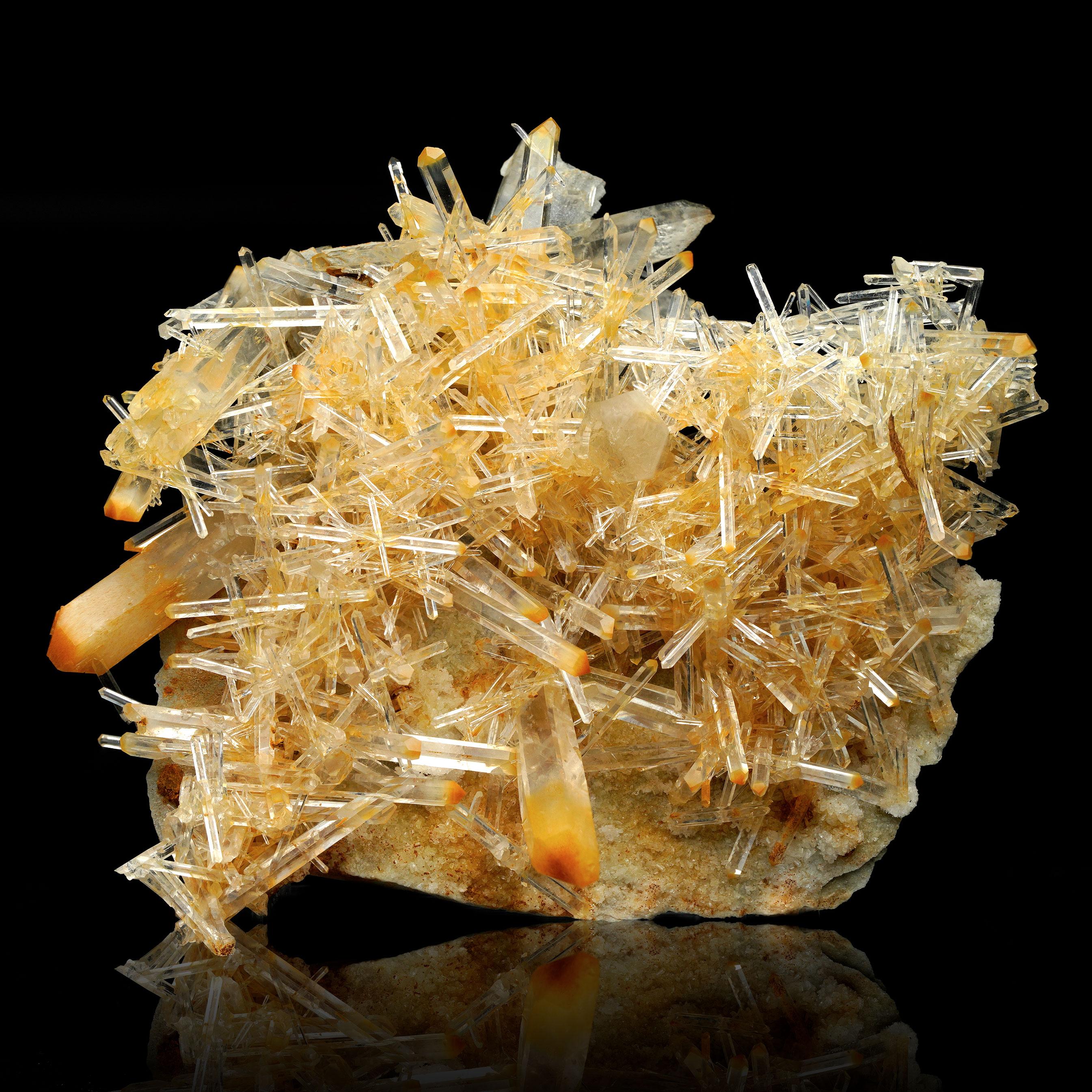 This stunning Mango Quartz with Halloysite specimen from Colombia combines the warm, vibrant tones of Mango Quartz with unique halloysite inclusions, creating a visually captivating natural piece. With its elegant structure and impressive display