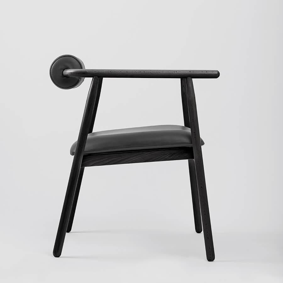 A sculptural expression of contemporary craftsmanship, the Manguito Chair. Designed and handcrafted by Unicuo, this piece strikes a bold balance between form and functionality. The Manguito Chair is not merely a seat — it is a design statement.