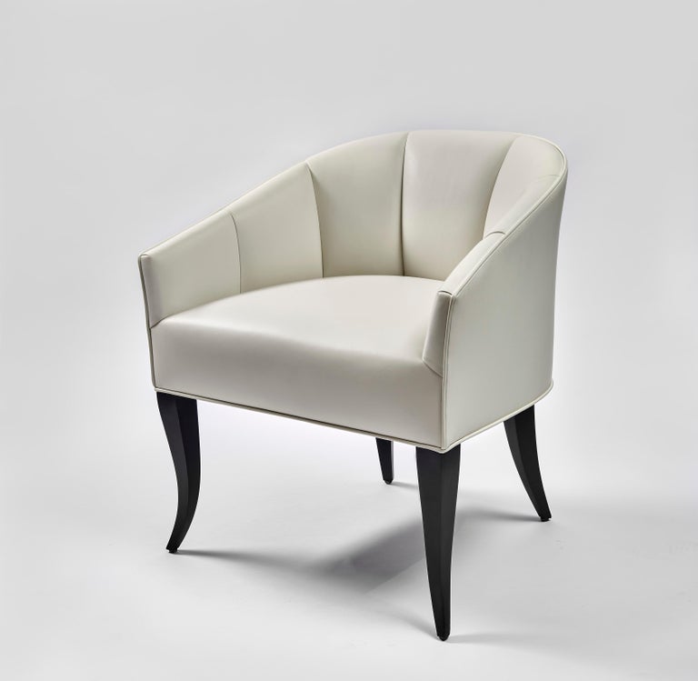 Contemporary upholstered chair 
Wood: Maple
Dimensions: 25.5