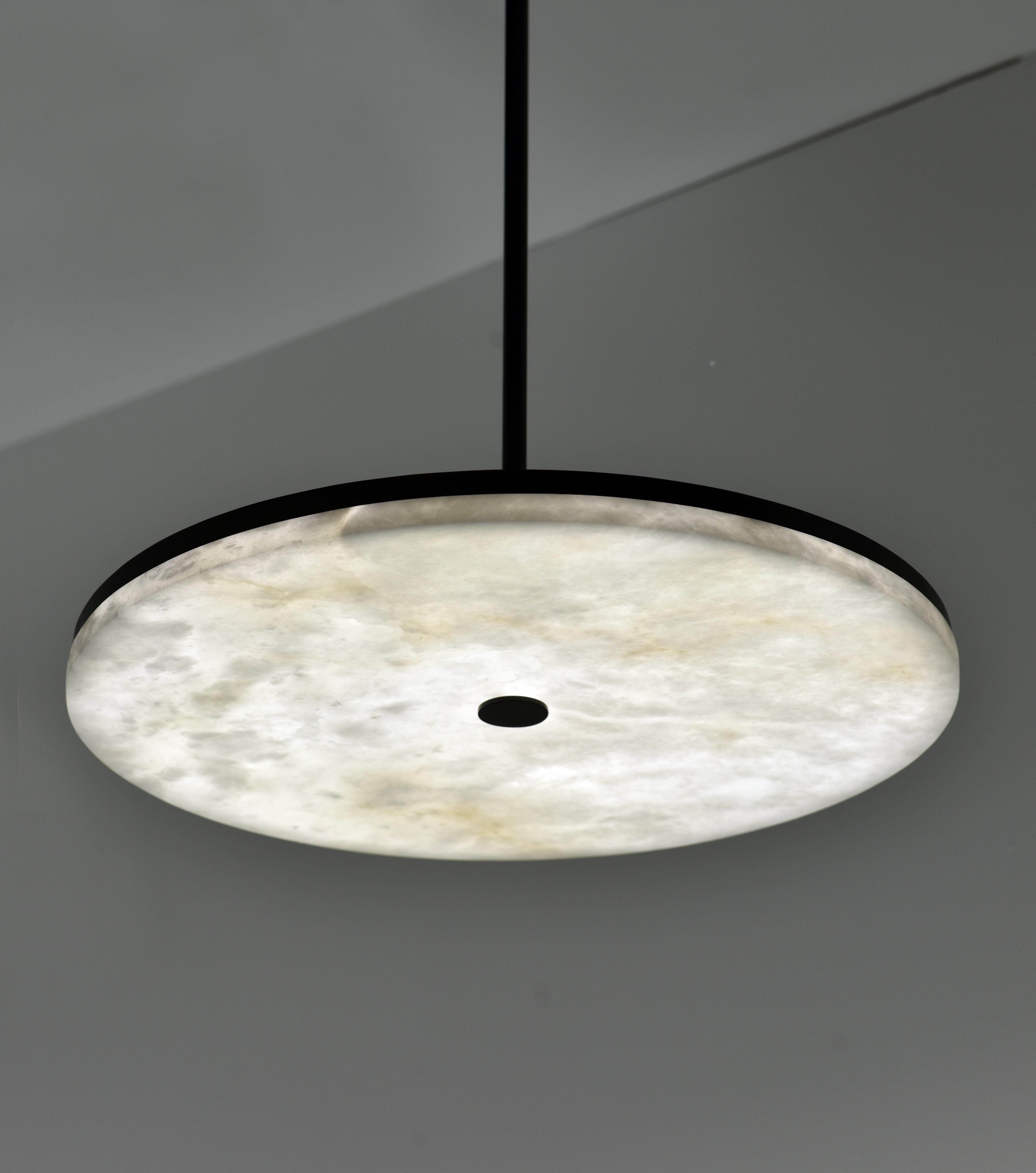 Manhattan pendant light by Atelier Alain Ellouz
Collection Atelier
© Atelier Alain Ellouz
Dimensions: Ø 27.5” x 1.3”
Materials: Alabaster
Weight: 53 lb

Measures: Metal rod Ø 0.6”, length to order min H 7.8” max H 118”
LED Strip 9.6W/m 24V
Dimmable