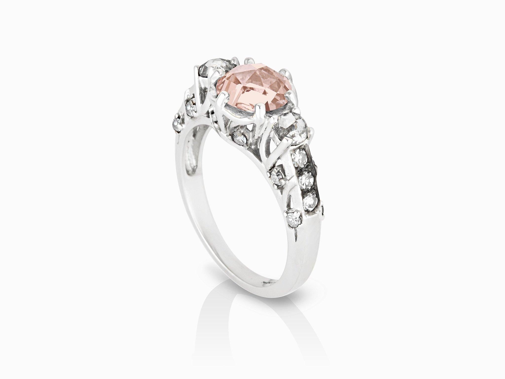 MANIAMANIA Ceremonial Engagement ring in 14k White Gold, with 7mm round Rose Cut Pink Tourmaline, two 3mm round rose cut rustic white diamonds (0.24 ctw), and accents and pavé of White Diamonds (0.5ctw). 
Size 5.
*This ring can also be hand made to