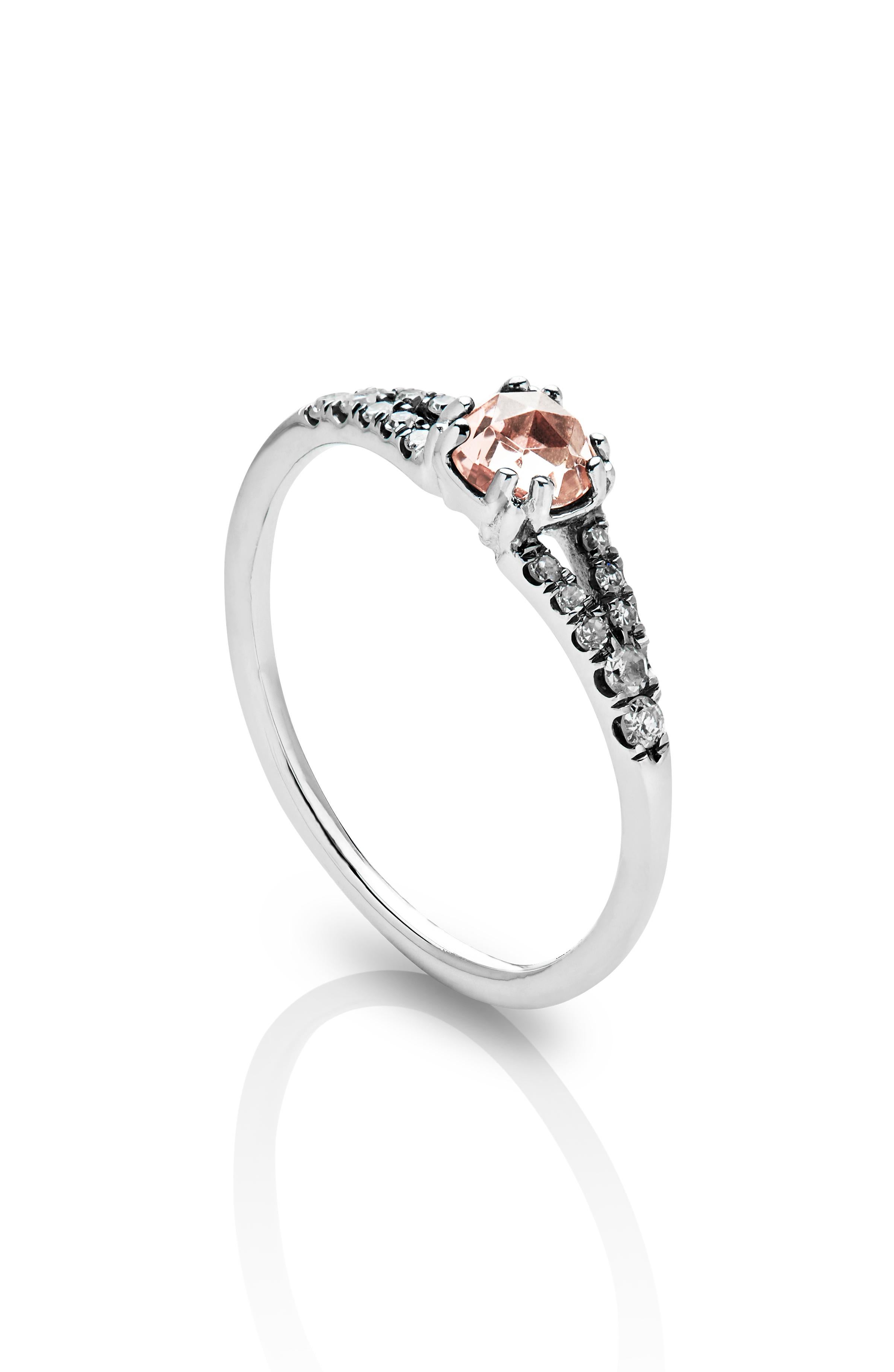 MANIAMANIA Devotion Engagement ring 14k White Gold with a 4.8mm round rose cut Peachy Pink Tourmaline center stone, with pavé of white diamonds (0.15-0.18 ctw). Size 5.5.

Hand made in New York, this Devotion ring is antique inspired in its design