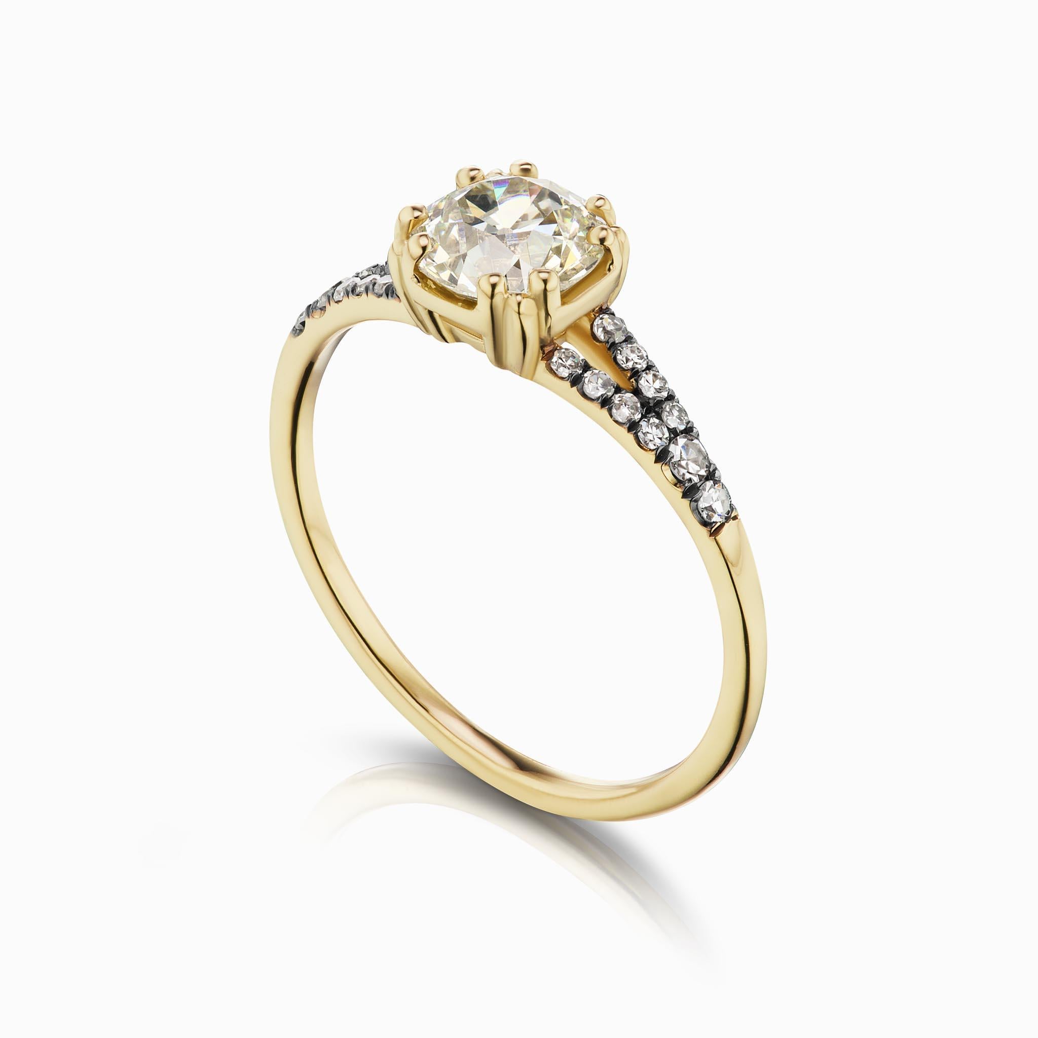 14k yellow gold ring with an Antique Reclaimed 4.8mm round Old European Cut White Diamond (0.35 ct), with pavé of white diamonds on split shank band (0.16 ctw). Size 7.

This Devotion ring is antique inspired in its design elements. Featuring an