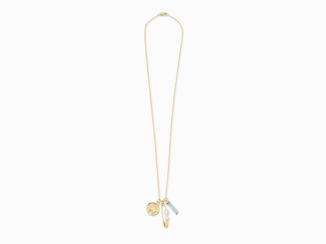 14k Yellow Gold Cable Chain Necklace (17.5 inch long), with a Zodiac charm pendant (*Taurus pictured), with a 14k Yellow Gold Safety Pin with 2 Natural Pearls, and Aquamarine charm with 14k Yellow gold setting. 
*Please let us know your Zodiac sign