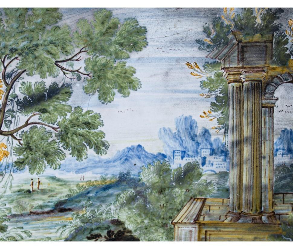 First half of the 18th century, Castelli Manufacture

Landscape with architecture and figures

Majolica, 16.5 x 21 cm

The item is in good condition