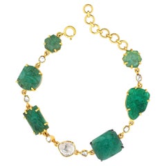 14 Karat Yellow Gold Mismatch Link Bracelet with Uncut Diamonds and Emerald
