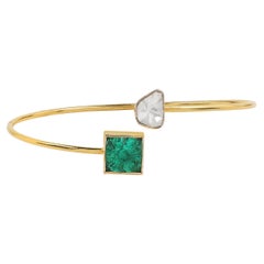 14 Karat Yellow Gold Square Wire Bracelet with Uncut Diamonds and Emerald