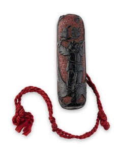 Manju Nestuke in black and lacquer decorated of a scene of child under a pine