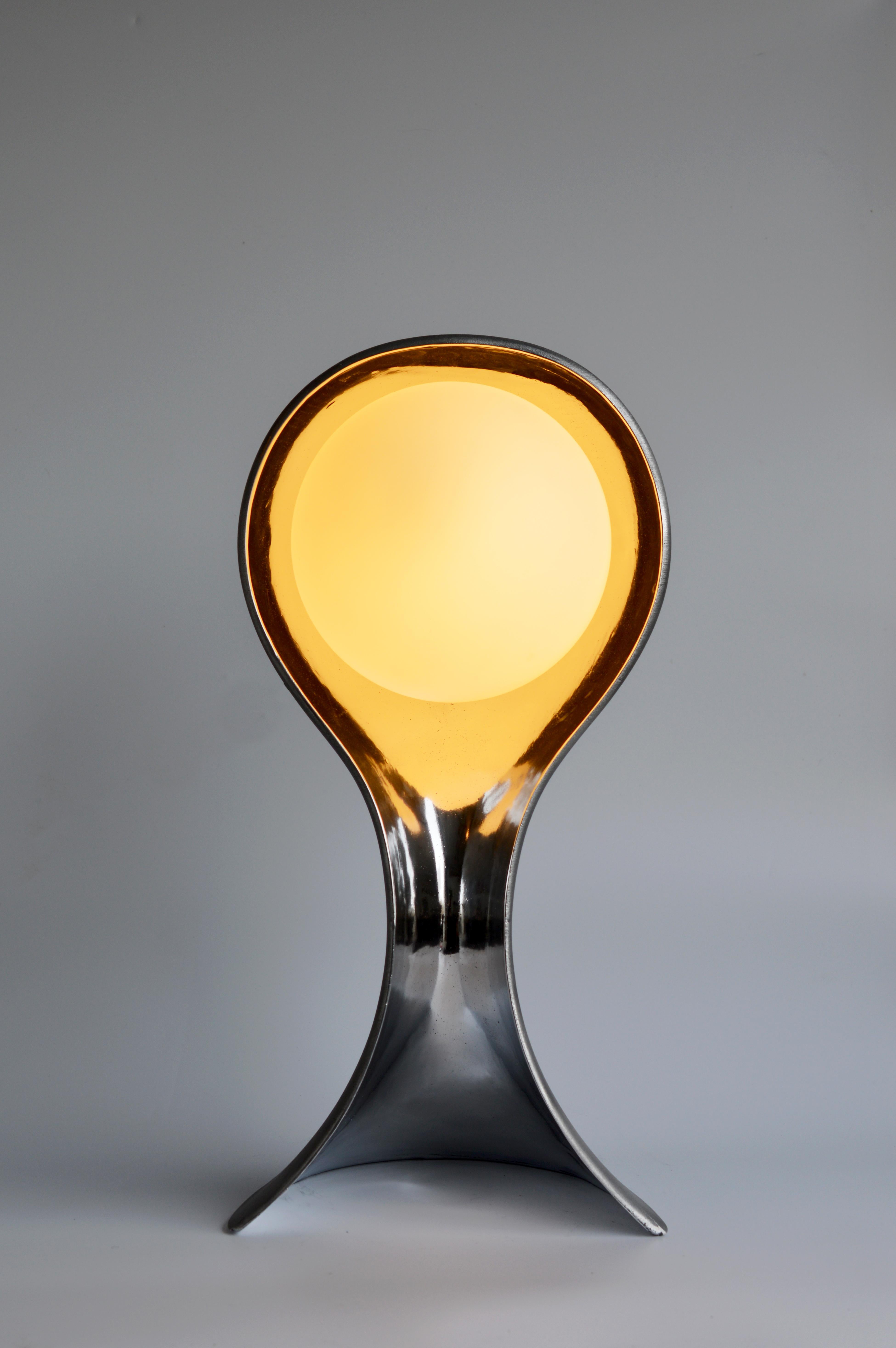Designer, Mike Ruiz Serra was inspired by Giorgio Morandi’s ghostly paintings of mannequin busts while creating this sculptural lamp. Crafted using the ancient technique of sand casting, each lamp is formed in aluminum, giving it a unique, organic