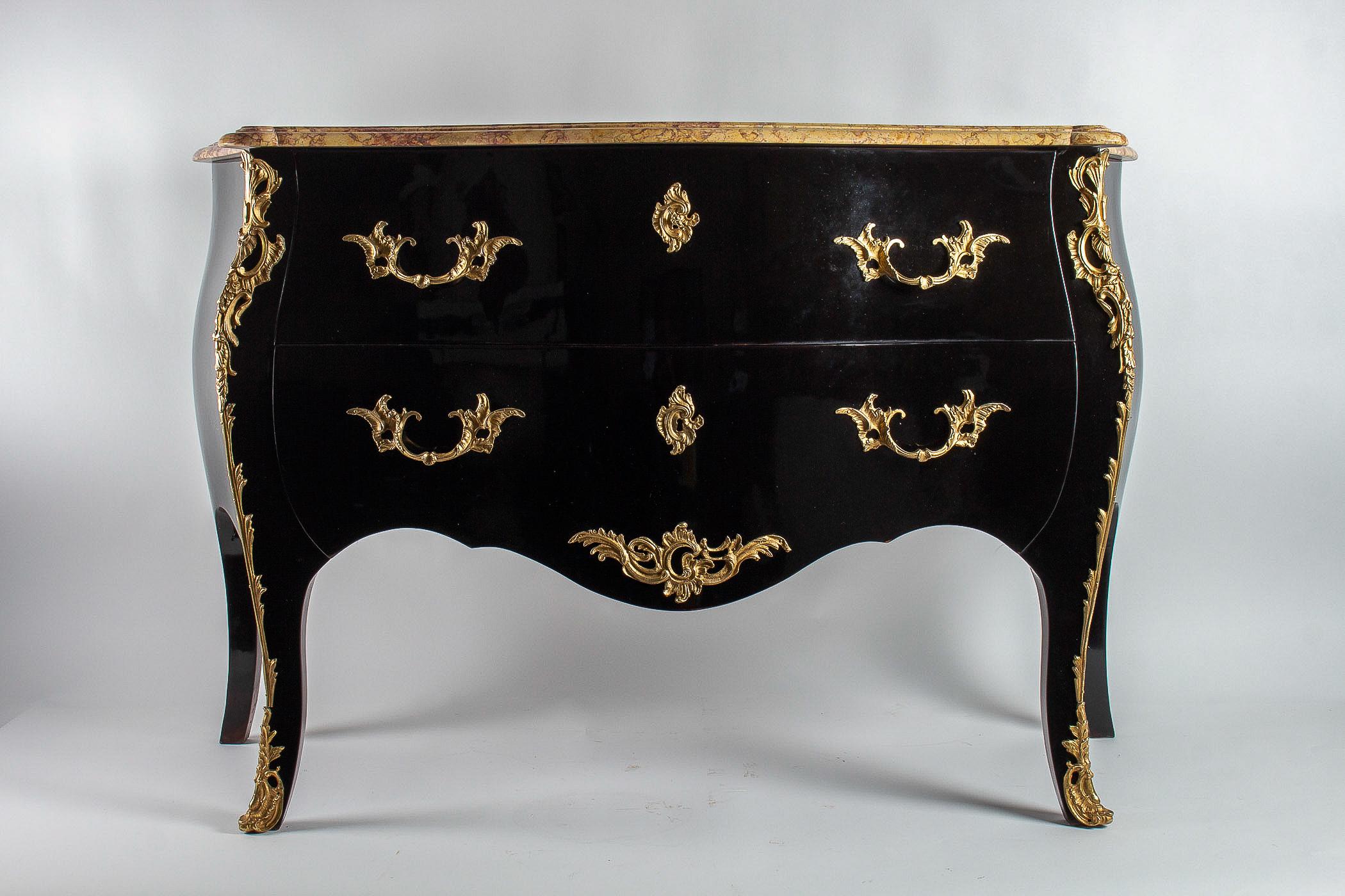 Manner of Jansen French Louis XV style black-lacquered commode, circa 1950

Elegant and decorative serpentine black-lacquered commode called « sauteuse ». Opening by two front drawers. The chest rests in lovely serpentine legs. Beautiful