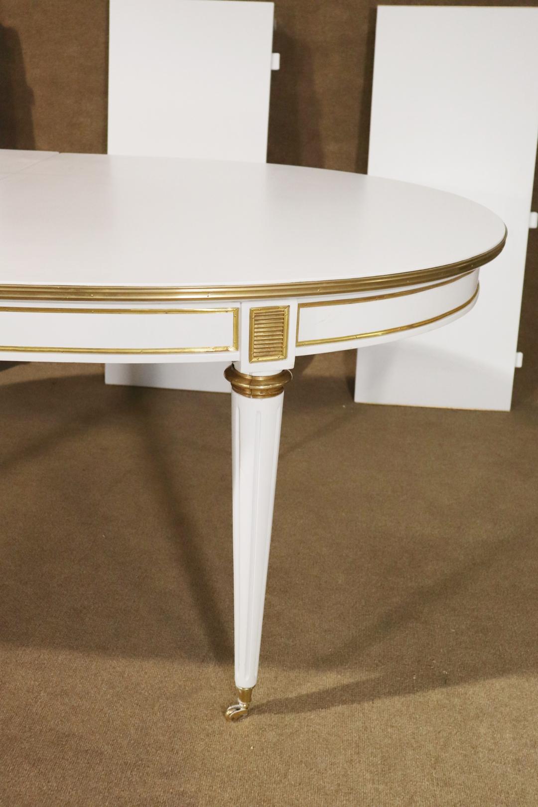 French Manner of Maison Jansen White Lacquer Bronze Mounted Dining Table 3 Leaves  For Sale