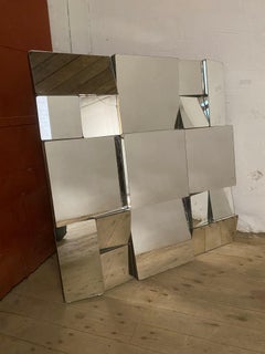 Manner of Neal Small Slopes Faceted Wall Mirror
