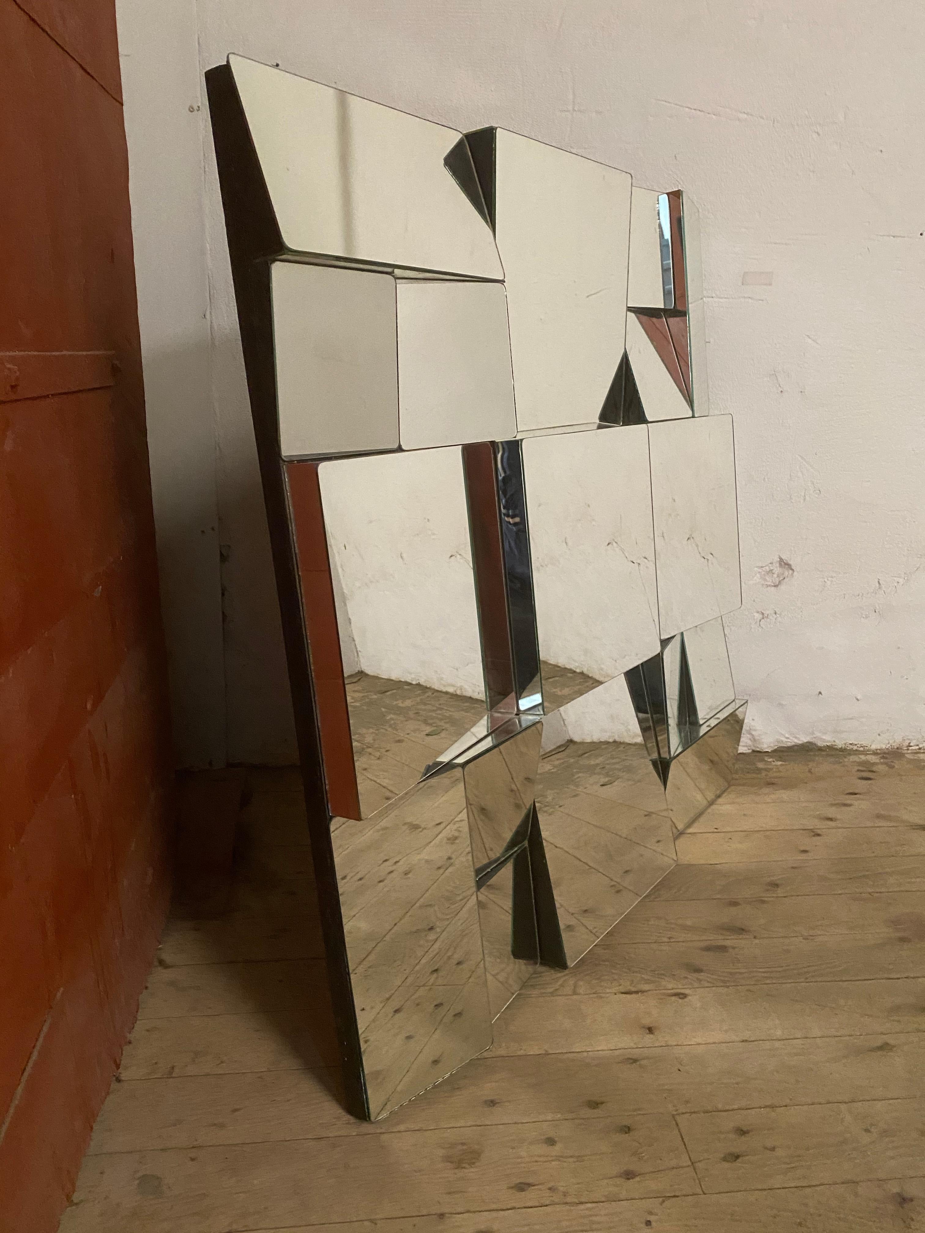 American Manner of Neal Small Slopes Faceted Wall Mirror For Sale