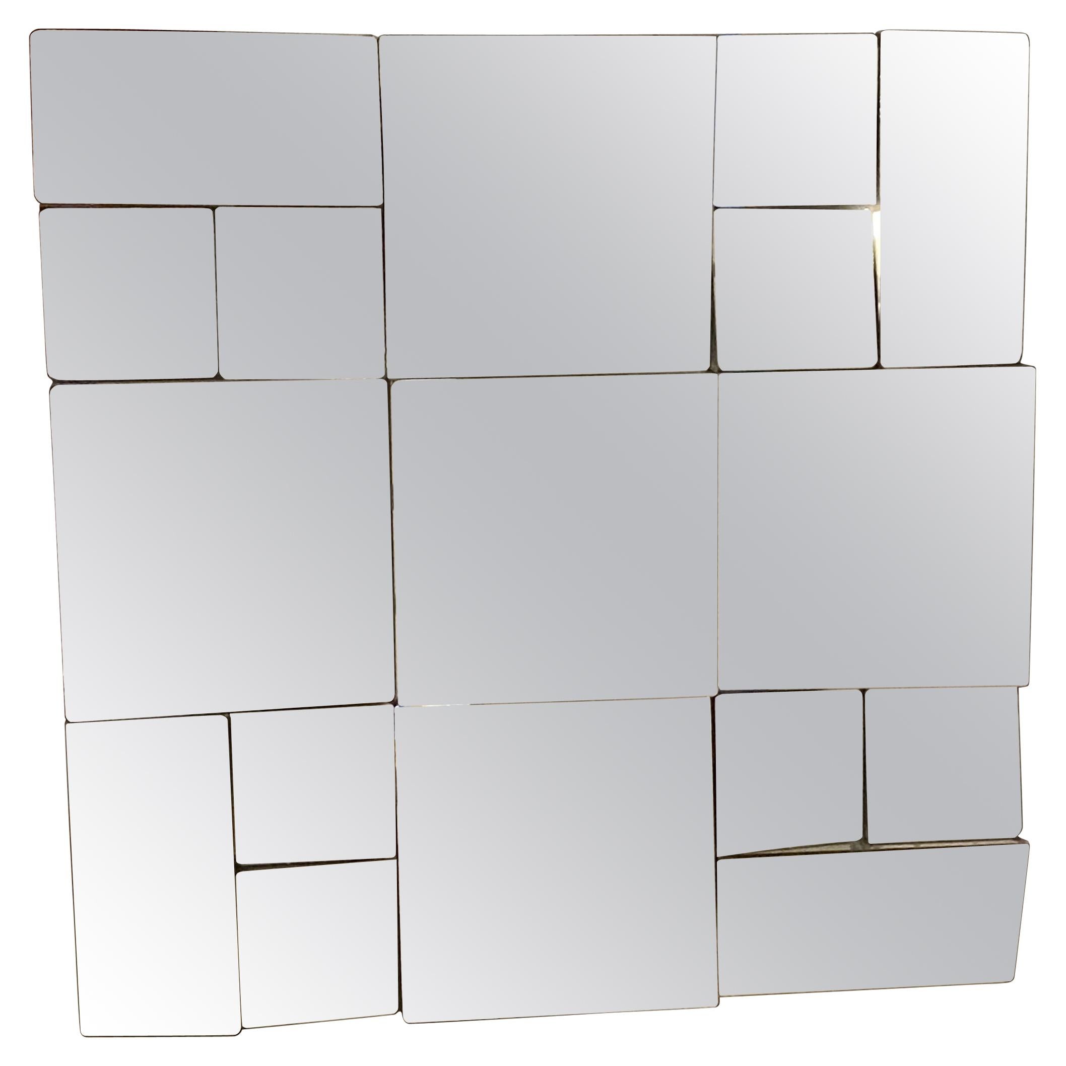 Manner of Neal Small Slopes Faceted Wall Mirror