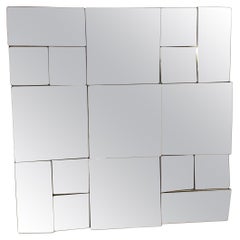 Retro Manner of Neal Small Slopes Faceted Wall Mirror