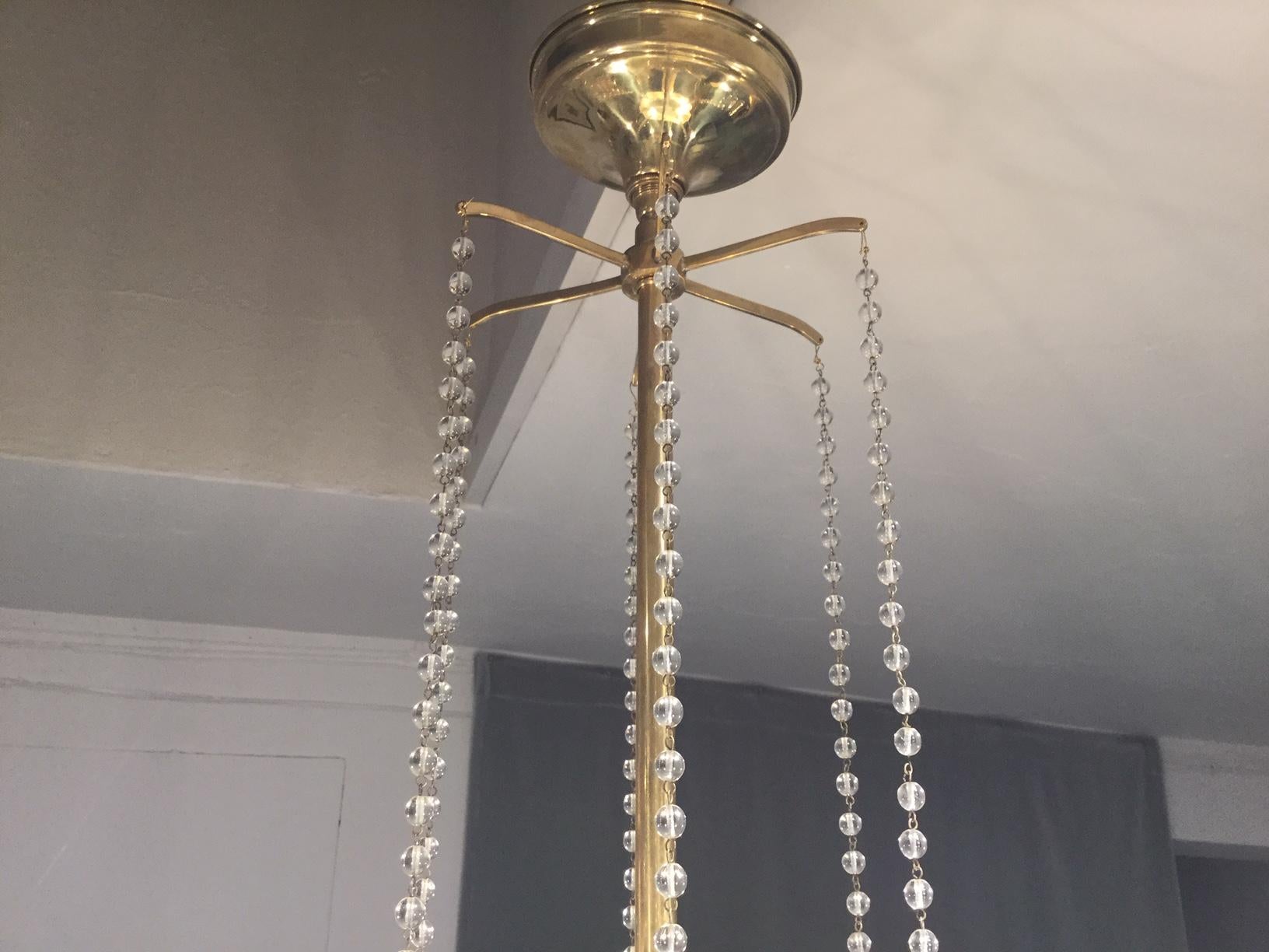 Manner of Tommi Parzinger Chandelier In Excellent Condition For Sale In LOS ANGELES, CA
